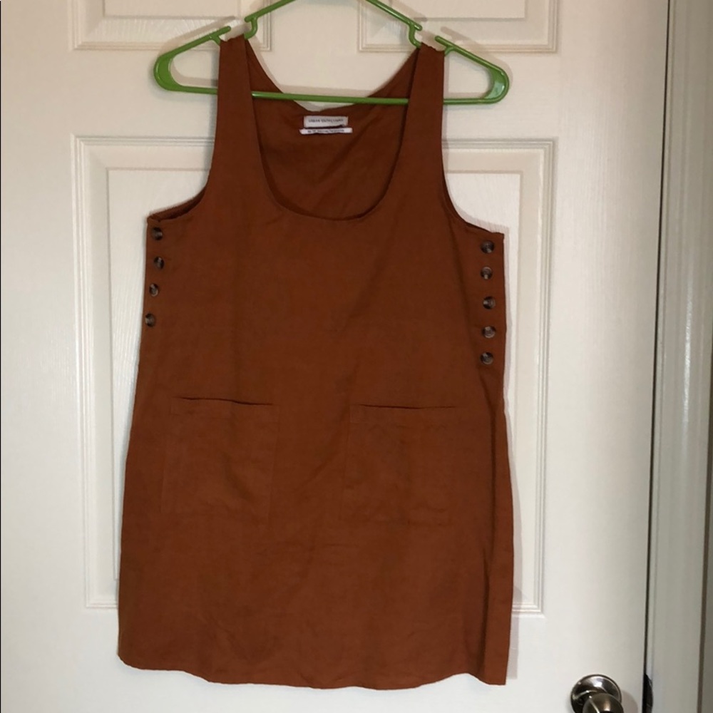 Mini linen dress with button detail.